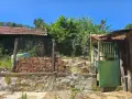 Продава се къща с голям двор 1,5 дка, гараж, стопански постройки и обновени инсталации, снимка 12