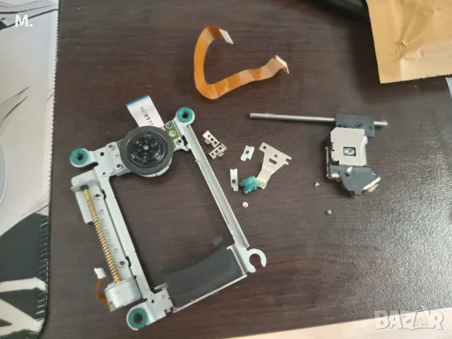 Части за дисково устройство и лазер за  PS2 Slim 77004