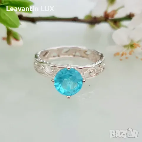 5756
Сребърен пръстен със син Топаз, снимка 1