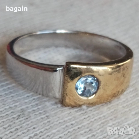 Сребърен пръстен с топаз и позлата.