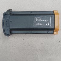 Canon DC адаптер DC-E1. , снимка 1 - Батерии, зарядни - 41945781