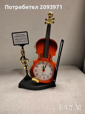 детски будилник под формата на цигулка с лък и ноти