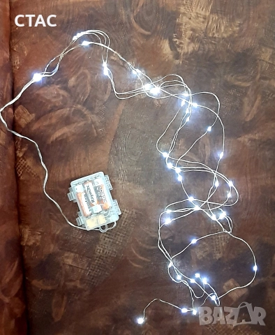 Светещи гирлянди иДве малки слончета за здраве и късмет