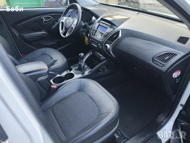 Hyundai ix35 2.0 CRDI, снимка 12 - Автомобили и джипове - 53748956