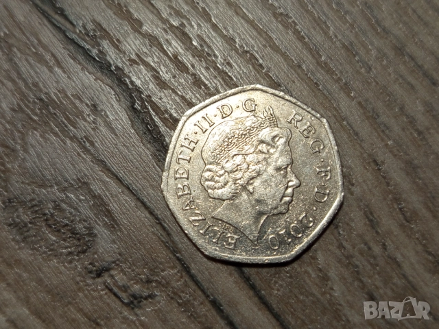 Монета 2010 Великобритания 50 pence 50p (100th Anniversary of Girlguiding) - Elizabeth II , снимка 4 - Нумизматика и бонистика - 51662038