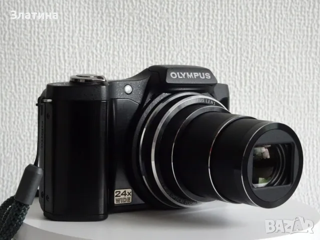 Olympus ZS-14 . 