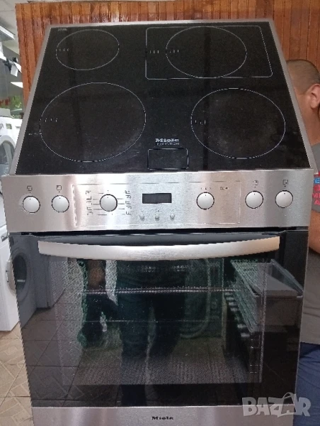 Иноксова печка за вграждане с индукционни котлони Миеле Miele 2 години гаранция!, снимка 1