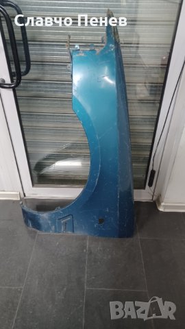 Калник преден ляв MAZDA323 Mk-2  89-94г седан., снимка 2 - Части - 39575035