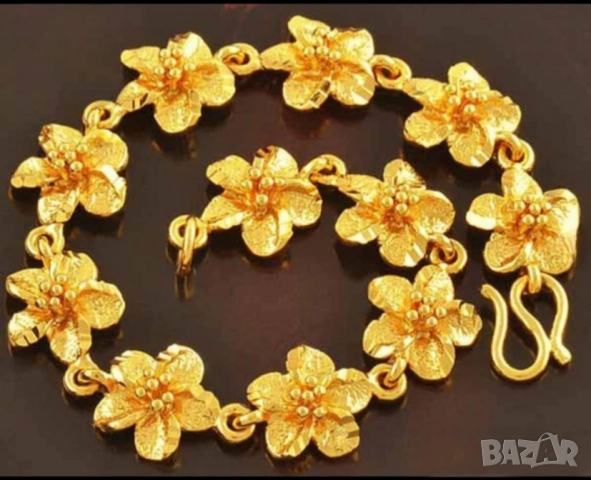 Нежна гривна цветя от 9к попълнено злато 20 лв.