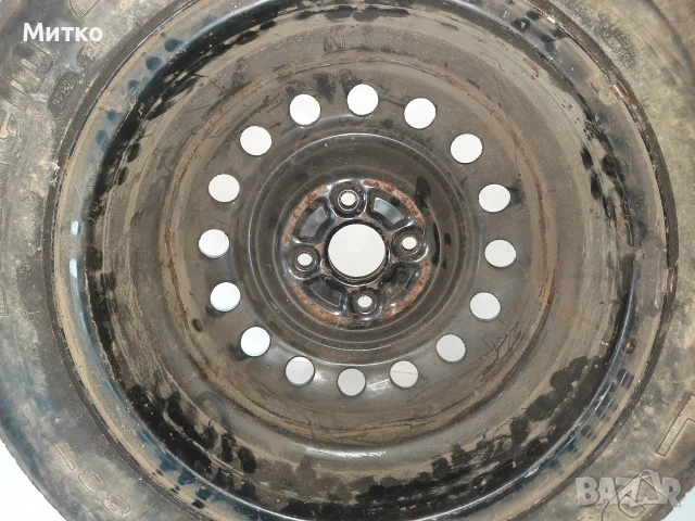 Желязна джанта с гума 15 ка за Тойота Ярис или Корола с 4 дупки, снимка 4 - Гуми и джанти - 53738925