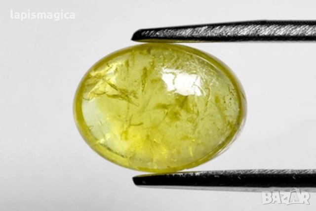 Жълт гросуларен гранат 1.68ct Овален кабошон