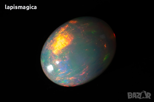 Етиопски опал 1.49ct 9x7mm овален кабошон, снимка 4 - Други - 52135214