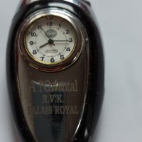 Запалка  с кварцов  часовник , снимка 1 - Други ценни предмети - 34852647
