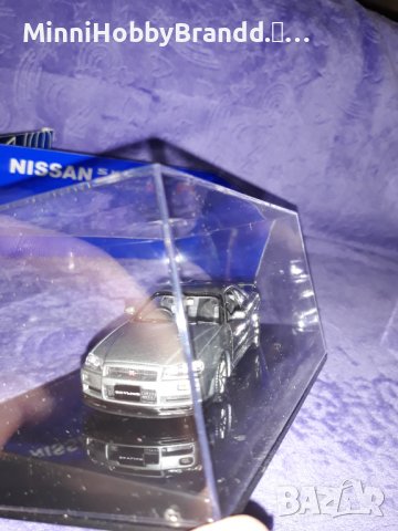 NISSAN  SKYLINE GT-R R 34 V spec AUTOart 1.43  Top Model , снимка 4 - Колекции - 39258739
