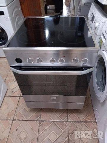 Иноксова свободно стояща печка с керамичен плот VOSS Electrolux с две години гаранция!