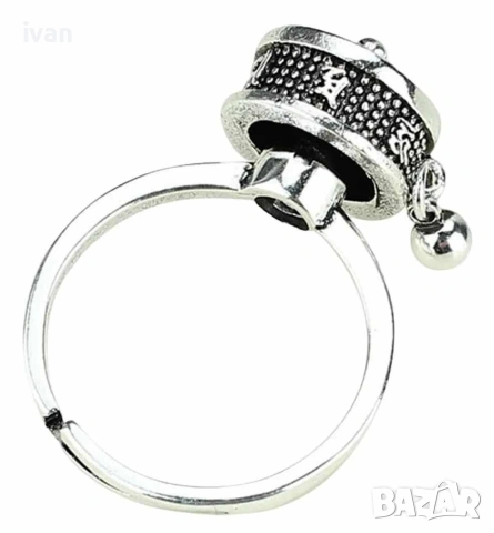 сребърен пръстен с ротационна корона 