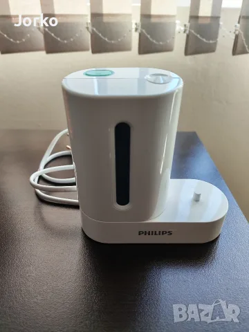 Зарядно четка Philips с UV стерилизатор