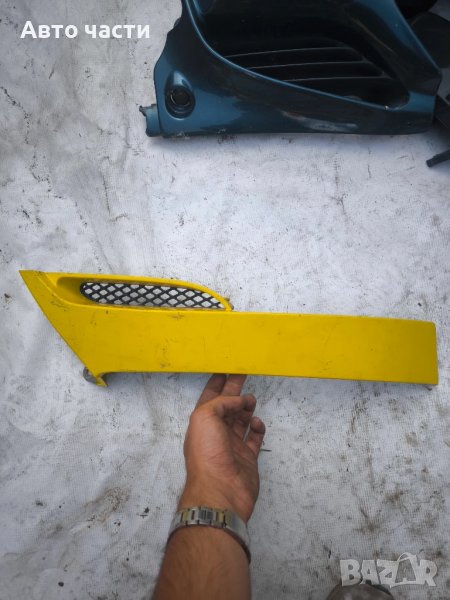 Chevrolet Tacuma 2.0i 90kW 2007 Предна дясна фарова решетка 96399874, снимка 1