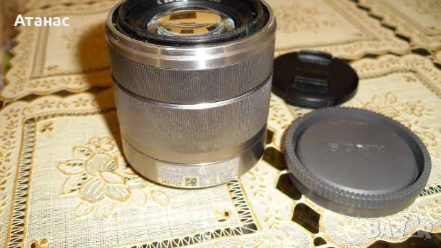 Обектив SONY E 18-55 OSS 3.5-5.6 за NEX, снимка 5 - Обективи и филтри - 44432060