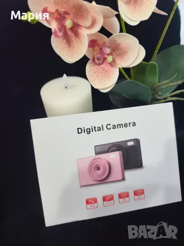 Дигитален фотоапарат в черно