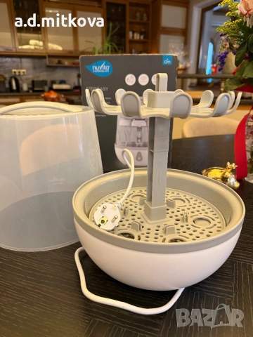 Парен стерилизатор за 6 шишета Nuvita - Sterieasy, снимка 2 - Стерилизатори - 53495269