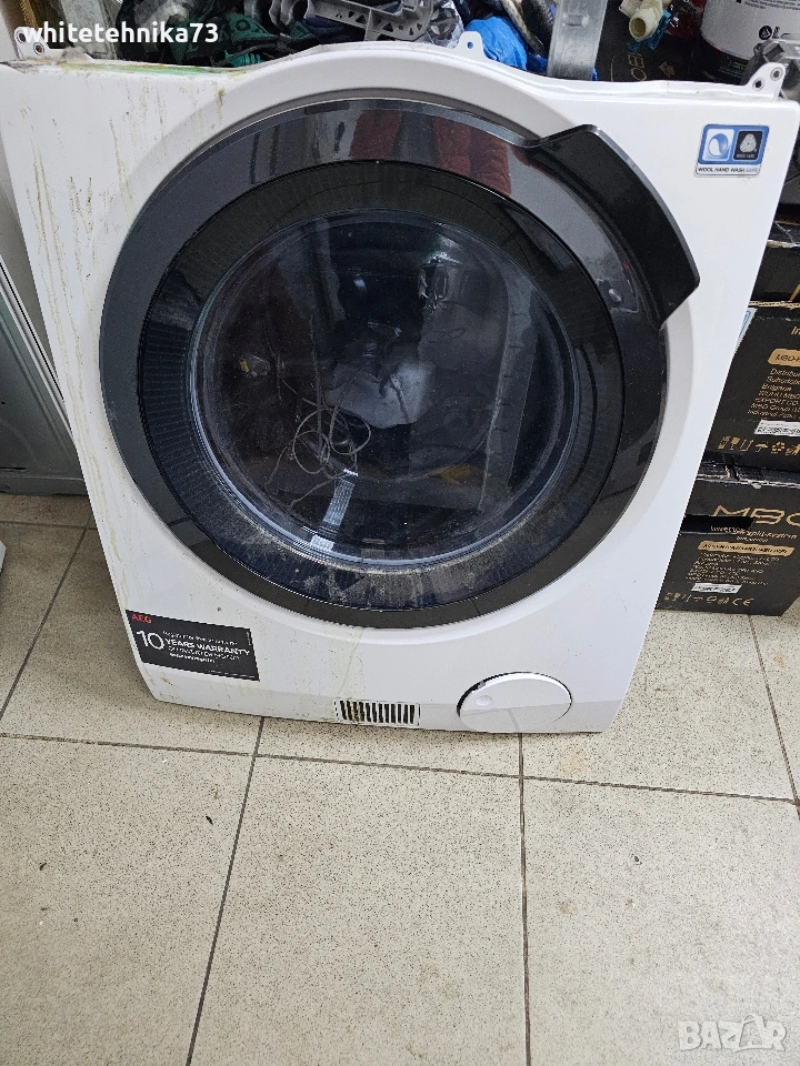 Предница със люк от пералня със сушилня AEG , снимка 1