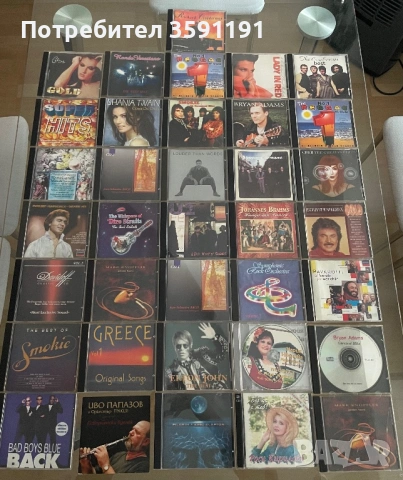 Продавам запазена колекция с музикални дискове