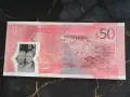 Банкнотa - Ямайка - 50 долара UNC (юбилейна) | 2022г., снимка 2