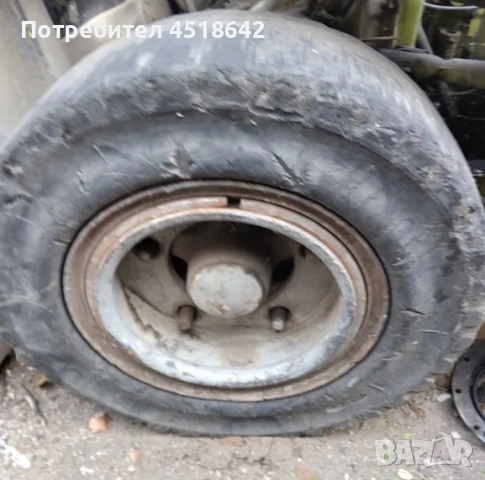 Бандажни гуми с джанти от мотокар Кларк Clark 6.50 x 10 и 7.00 - 12, снимка 10 - Гуми и джанти - 51947370