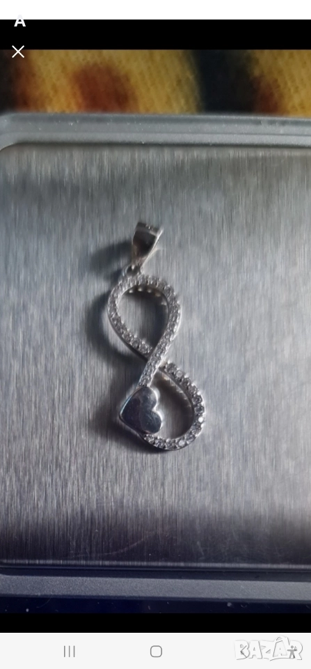 Сребърен медальон с символа на безкрайността , снимка 1