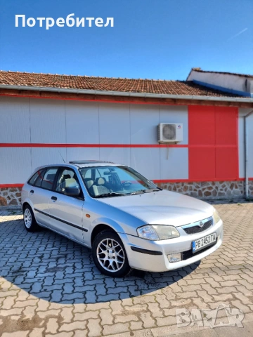 Mazda 323F Газ бензин, снимка 7 - Автомобили и джипове - 53581677