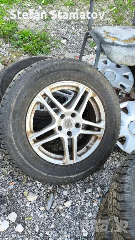 зимни гуми с джанти 235/65/17 дот 2821г. от Киа Соренто 2010