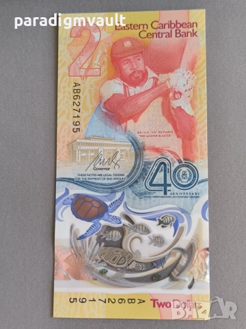 Банкнота - Източни Кариби - 2 долара (юбилейна) UNC | 2023г., снимка 4 - Нумизматика и бонистика - 52226673