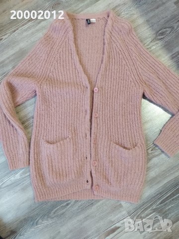 Розова обемна жилетка Н&М