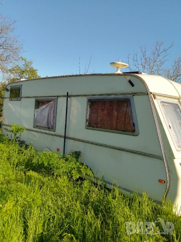 Каравана с много екстри- договаряне, снимка 4 - Каравани и кемпери - 50128349