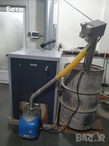 Котел на пелети Bosch 32 kW, снимка 2 - Отоплителни печки - 52235041