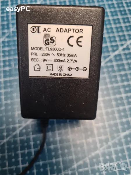 Оригинален захранващ адаптер TL9300D-4 9V 300mA, снимка 1