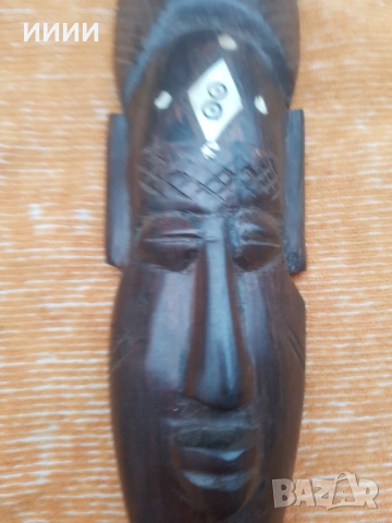 Маска от абаносово дърво 