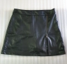 Къса пола от еко кожа с панталонки. Обиколка на талията 82см., снимка 2