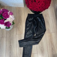 Нов разкошен черен кожен панталон ластик в талията лек потур, снимка 2 - Панталони - 41061208
