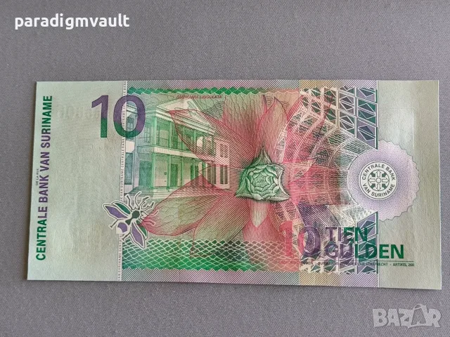 Банкнота - Суринам - 10 гулдена UNC | 2000г., снимка 2 - Нумизматика и бонистика - 55971446