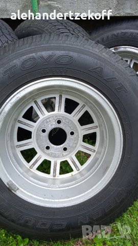 Гуми с джанти р215/75/15  100 S m+s  за Cherokee, снимка 6 - Гуми и джанти - 41322630