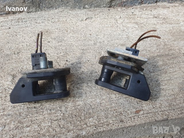 Насрещник с бутон за бравата бмв е34 бутонии на колонката за врата бмв е 34