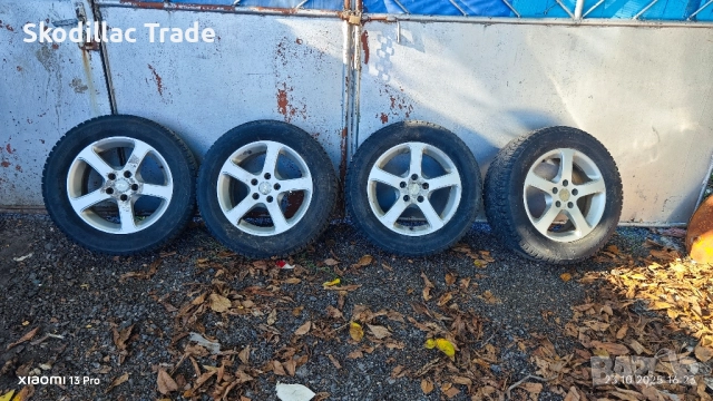 Алуминиеви джанти 17" със зимни гуми с шипове.