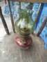 Стара газена лампа с кръгъл фитил със зелено прозрачно шише