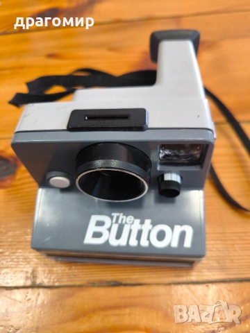 POLAROID LAND CAMERA The Button