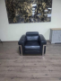Черен кожен фотьойл Moreno с електрически релаксиращ механизъм, снимка 1 - Дивани и мека мебел - 44701881