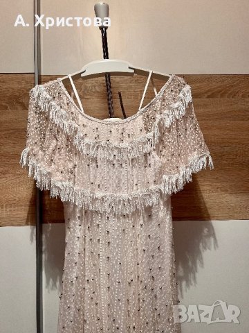 Бяла бутикова рокля 