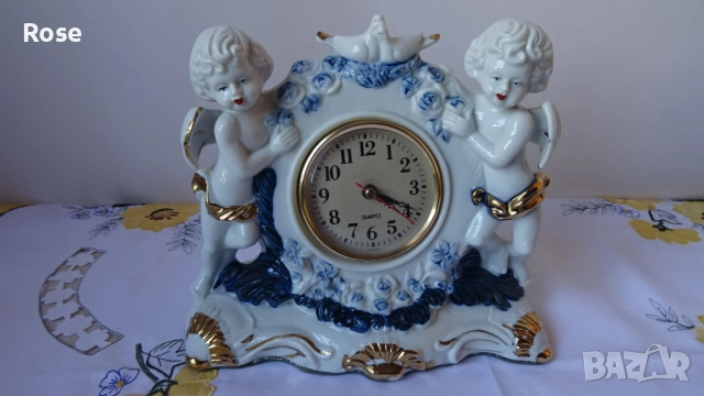 Порцеланов настолен часовник с херувими и гълъби. 