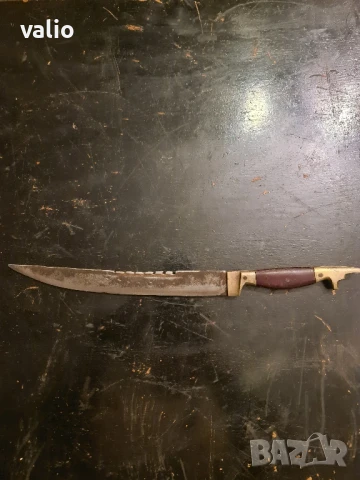 Стар голям нож с кучешка глава